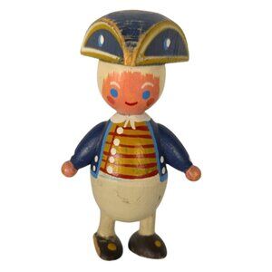 Vintage Wooden Soldier Toy with Blue and Red Outfit